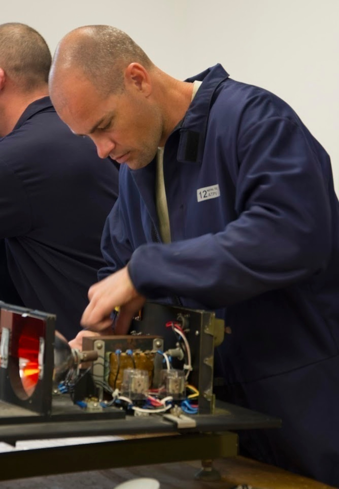 U.S. Air Force Tech. Sgt. Jesse M. Marquez, a 624th Civil Engineer electrician, troubleshoots strobe lights during the Silver Flag training exercise at Tyndall Air Force Base, Florida, March 1, 2017.  Strobe lighting is part of the Approach Lighting System installed on the approach end of an airport runway. The 624th CES based out of Joint Base Pearl Harbor-Hickam, Hawaii supports the 624th Regional Support Group's mission to deliver mission essential capability through combat readiness, quality management and peacetime deployments to any area of responsibility.  (U.S. Air Force photo by Master Sgt. Raquel Griffin)