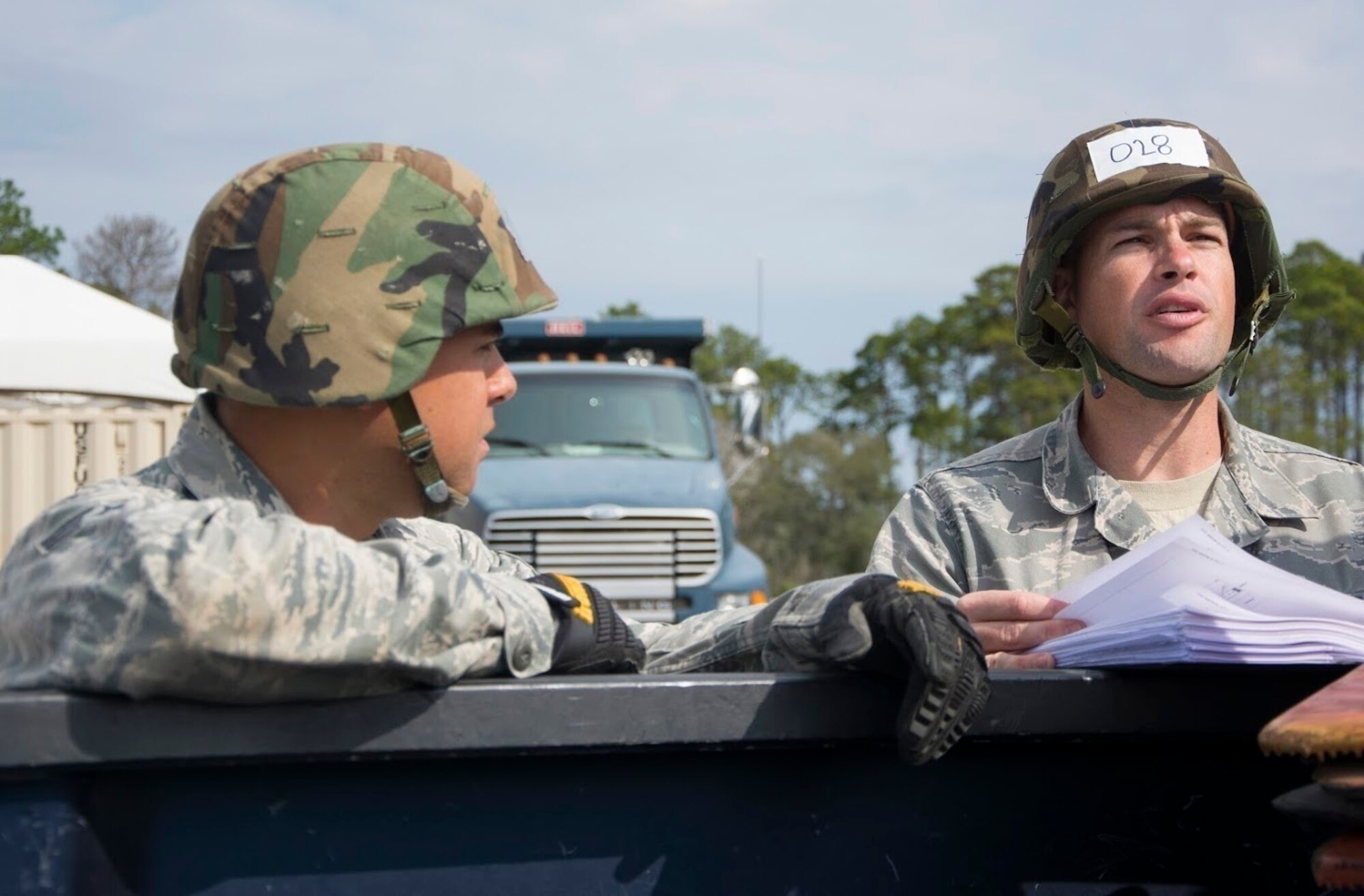 U.S. Air Force Tech. Sgt. Jesse M. Marquez and Staff Sgt. Jason J. Merseburgh, 624th Civil Engineer electricians, plan how they will set up the Emergency Airfield Lighting System during the Silver Flag training exercise at Tyndall Air Force Base, Florida, March 2, 2017.  EALS is a runway lighting system designed to be quickly installed at contingency airfields.  The 624th Civil Engineering Squadron based out of Joint Base Pearl Harbor-Hickam, Hawaii, supports the 624th Regional Support Group's mission to deliver mission essential capability through combat readiness, quality management and peacetime deployments to any area of responsibility. (U.S. Air Force photo by Master Sgt. Raquel Griffin)
