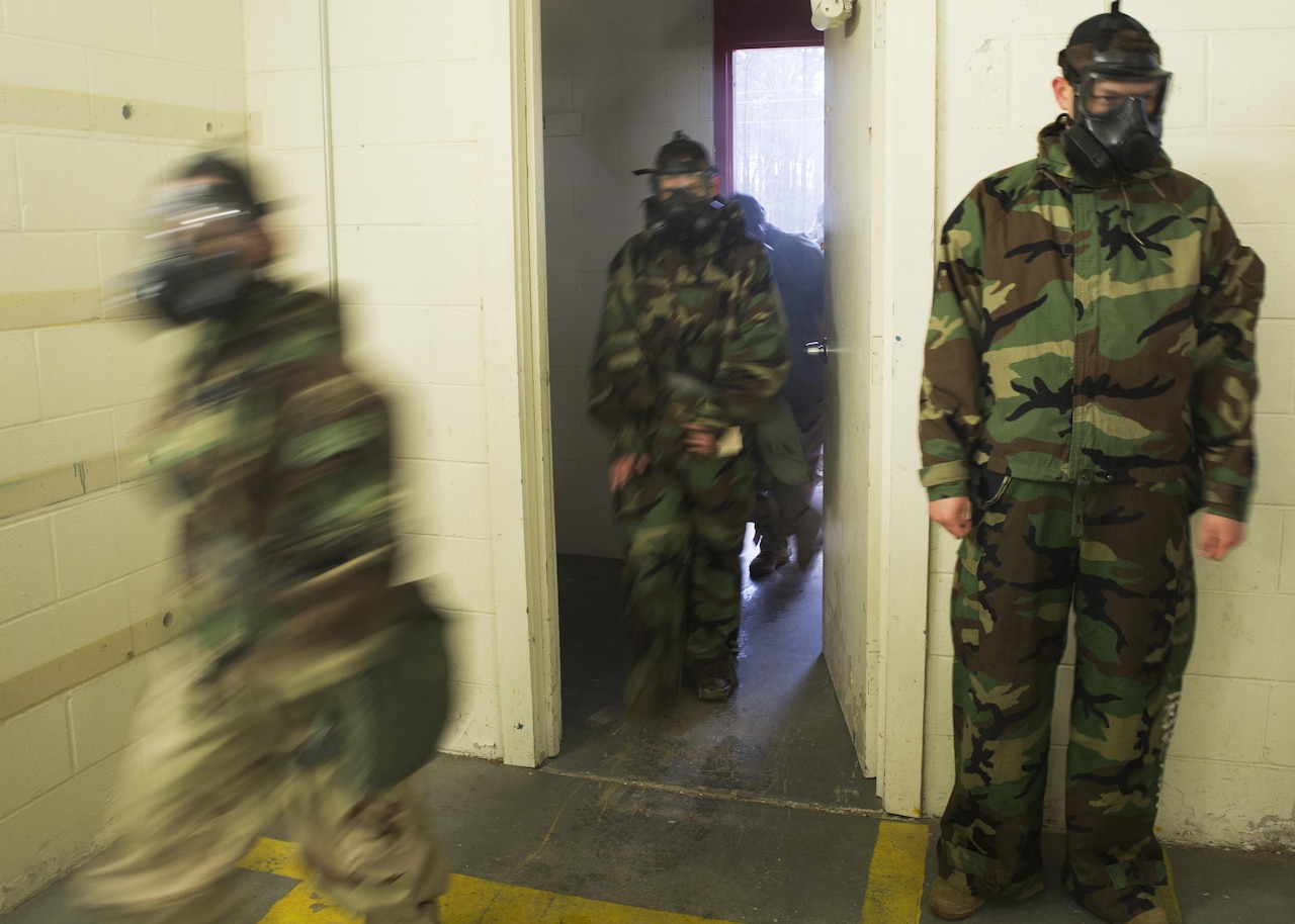 Marines walk into a gas chamber at Camp Lejeune, N.C. March 14, 2017. 2nd Supply Battalion conducted gas chamber training to ensure that Marines are capable of defending themselves in case of a chemical, biological, radiological or nuclear attack. (U.S. Marine Corps photo by Lance Cpl. Raul Torres)