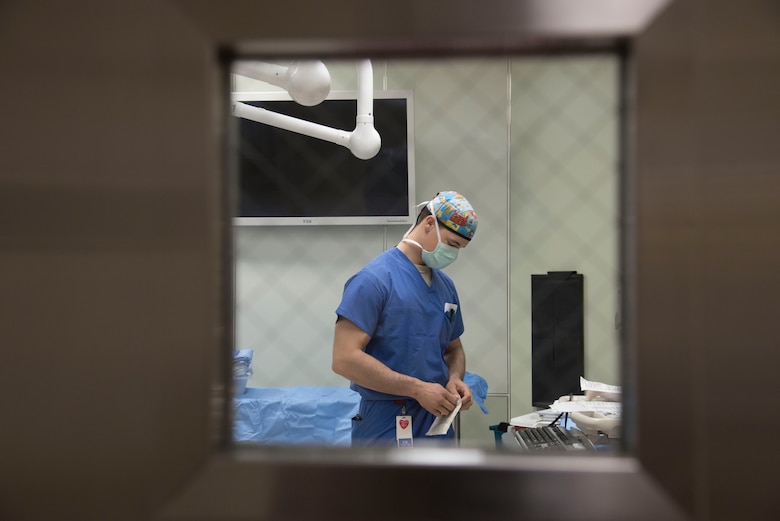 U.S. Air Force Airman 1st Class Thor Shaefer, a 35th Surgical Squadron surgical service technician, prepares a room for surgery at Misawa Air Base, Japan, March 13, 2017. Prior to surgeries, technicians sterilize themselves and stock the room with the specific equipment required for the operation. (U.S. Air Force photo by Airman 1st Class Sadie Colbert)