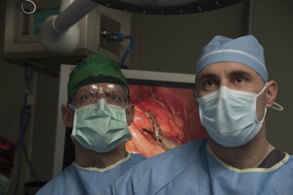 U.S. Air Force Lt. Col. Shawnn Nichols, left, a 959th Medical Group general surgeon, surgeon oncologist and program mentor, oversees a surgery as Capt. Lee Hafen, a 35th Medical Group general surgeon, exposes an appendix at Misawa Air Base, Japan, March 13, 2017. Misawa was chosen as the first base to test the Small Hospital Clinic Skills Enhancement program. 
(U.S. Air Force photo by Airman 1st Class Sadie Colbert)
