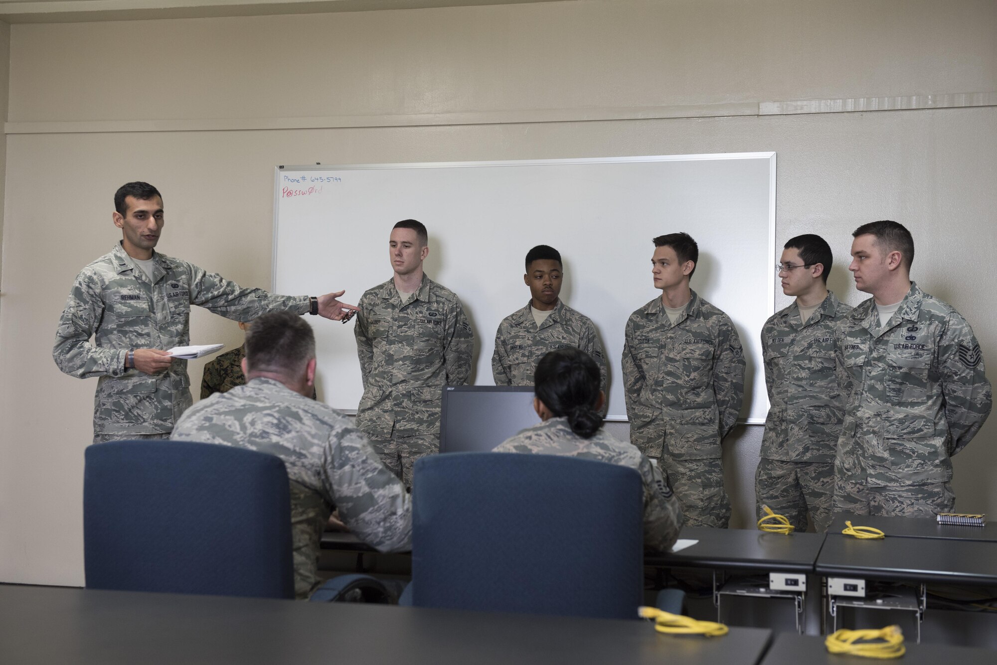 U.S. Air Force 1st Lt. Qadeer Rheman, 18th Contracting Squadron contracting officer, conducts a commander briefing during an operational contracting support joint exercise Jan. 24, 2017, at Camp Foster, Japan. During the scenario, officers and finance agents briefed the commander about what they could provide, the amount of money they could request, and asked the commander for their priorities. (U.S. Air Force photo by Senior Airman Omari Bernard)