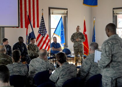 Missouri Army National Guard Capt. Derek Ditch, Missouri
National Guard Joint Cyber Computer Network Defense Team,
responds to a question from senior leaders as part of a panel of
Cyber Protection Team experts drawn from the active duty
military, the National Guard, and NASA during the state militia’s
first Cyber Summit, held at historic Jefferson Barracks Air National
Guard Base, Missouri, March. 6-10. 