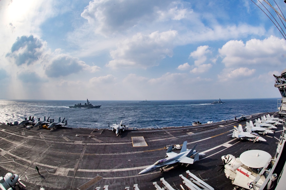 The Japan Maritime Self-Defense Force Murasame-class destroyer JS Samidare, left, the Arleigh Burke-class guided-missile destroyer USS Wayne E. Meyer, center, and the Japan Maritime Self-Defense Force Takanami-class destroyer JS Sazanami, transit the East China Sea alongside the aircraft carrier USS Carl Vinson,  March 8, 2017. Navy photo by Petty Officer 2nd Class Sean M. Castellano