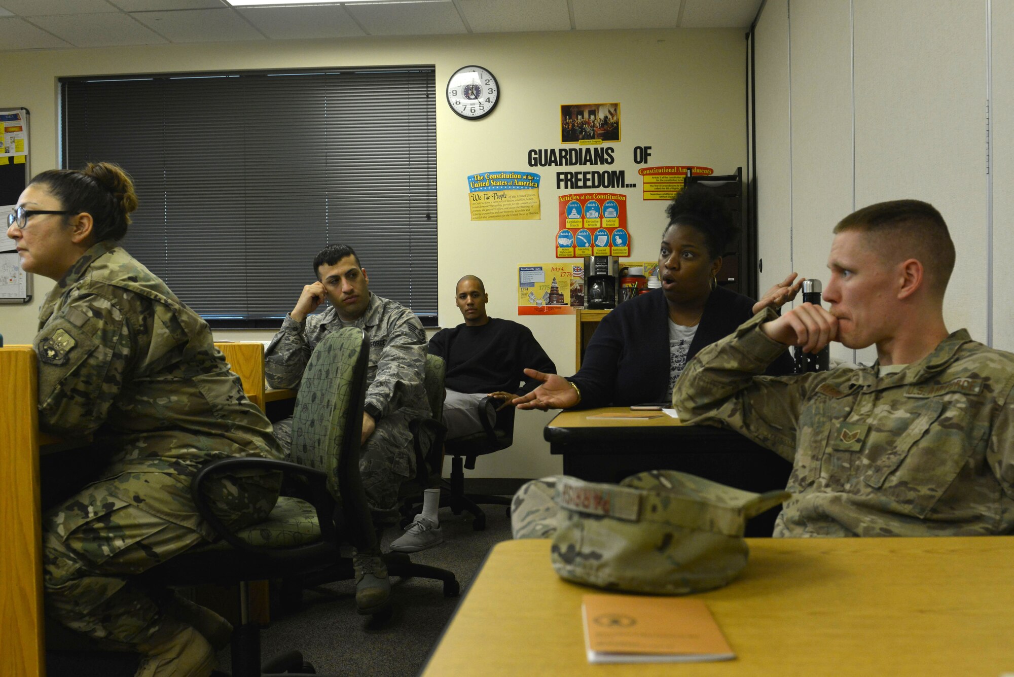 An attendee of the Shaw Philosophy Society discusses her views at Shaw Air Force Base, S.C., March 14, 2017. Attendees discussed the ideas of good and evil using superhero and supervillain characters and common themes in comic books as examples. (U.S. Air Force photo by Airman 1st Class Destinee Sweeney)