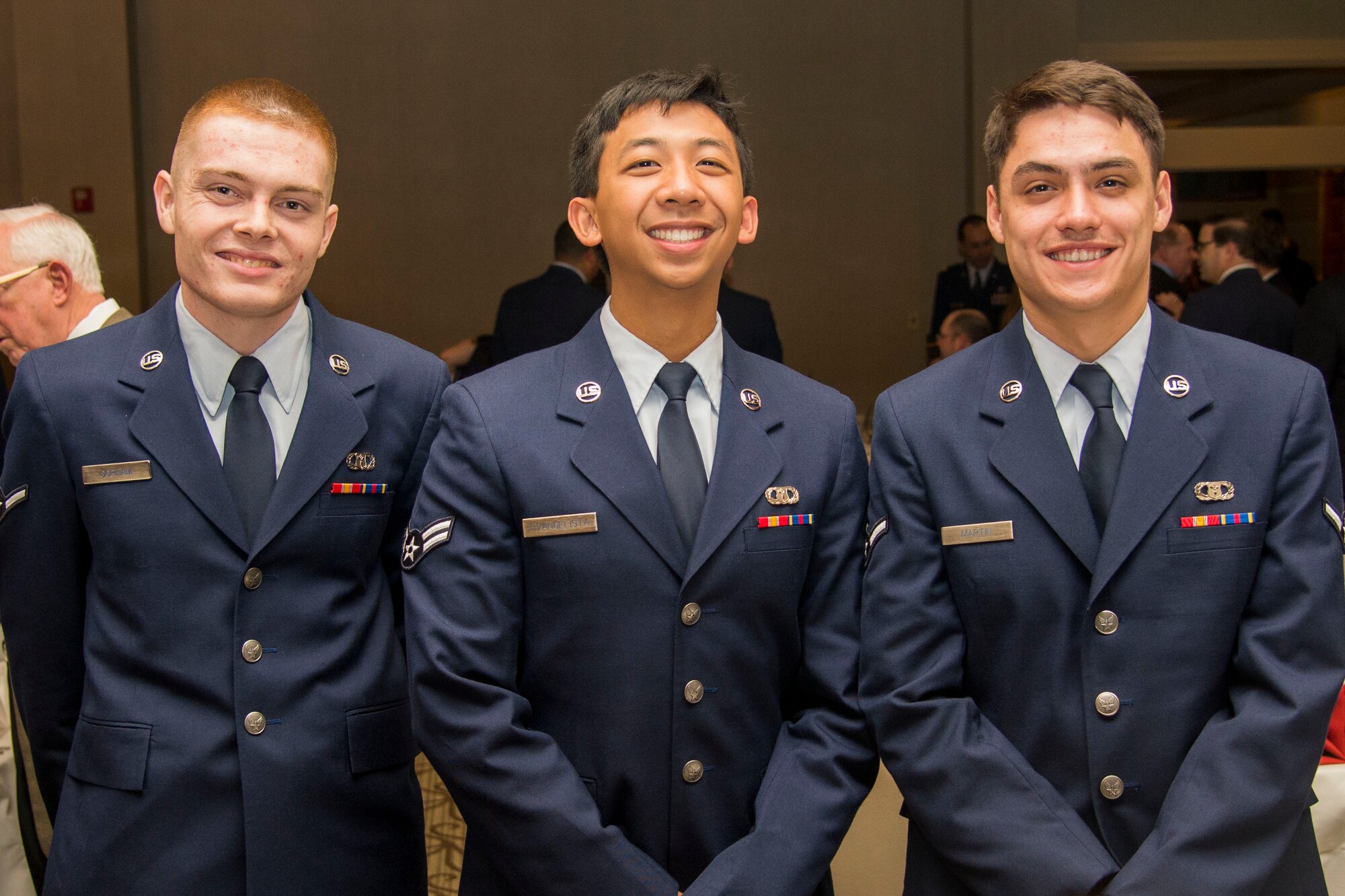 Airman from the 15th Operational weather Squadron pose for a photo during the 67th Annual Belle-Scott Enlisted Dinner at the St. Clair Golf Club March 9. The dinner is hosted by the Belle-Scott committee to show the appreciation the local community has for enlisted military members. (U.S. Air Force photo by Airman Chad Gorecki)