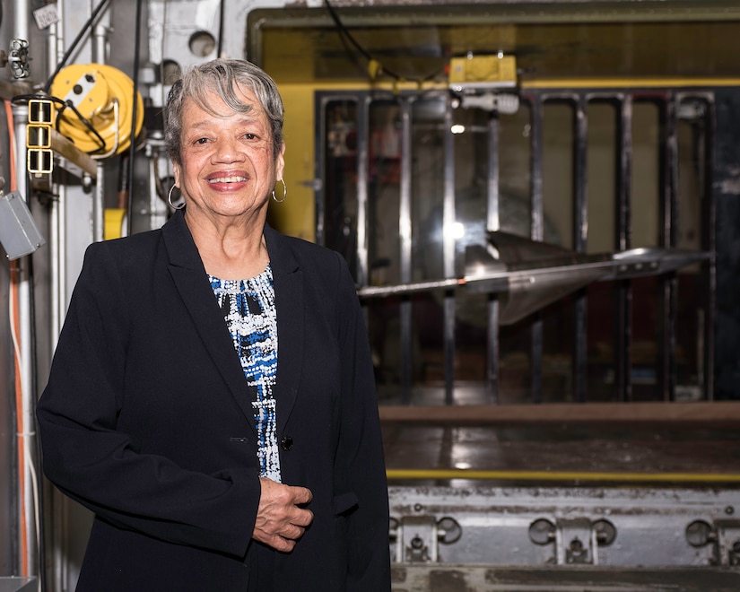 Dr. Christine Darden, retired NASA aerospace engineer, stands next to NASA’s Supersonic Wind tunnel used to test air craft models at the NASA Langley Research Center, Hampton, Va., March 1, 2017.  During her time with NASA, Darden used the tunnel to determine performance capability of various military and civilian aircraft. (U.S. Air Force photo/ Bobbie Moore).