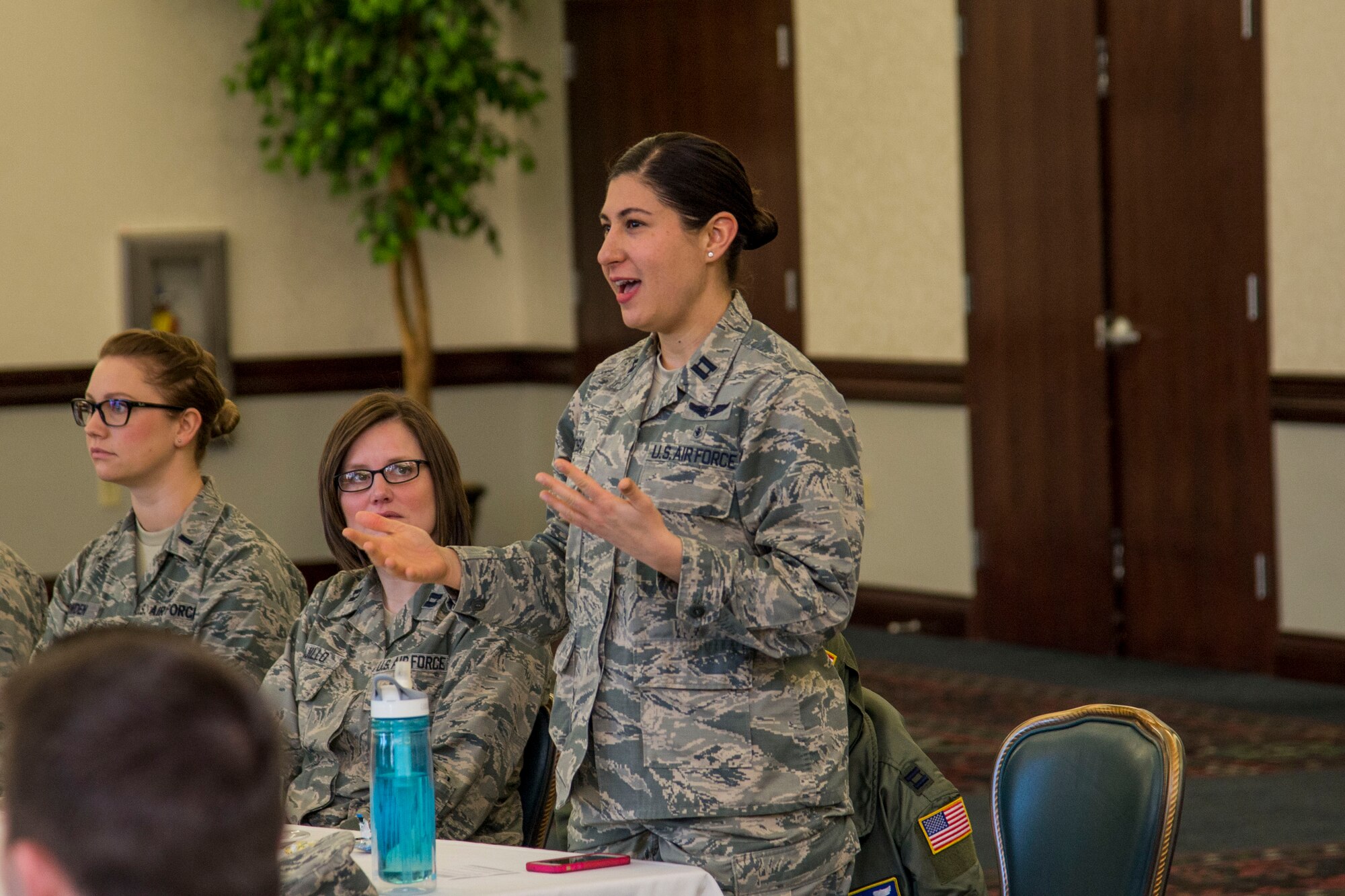 a company grade officer asks a question during the 5th Annual CGO Conference at the Scott Event Center Feb. 27. CGO's were able to speak with feild grade officers and other enlisted members about their experiences in leadership throughout their careers.(U.S. Air Force photoby Airman Chad Gorecki.)
