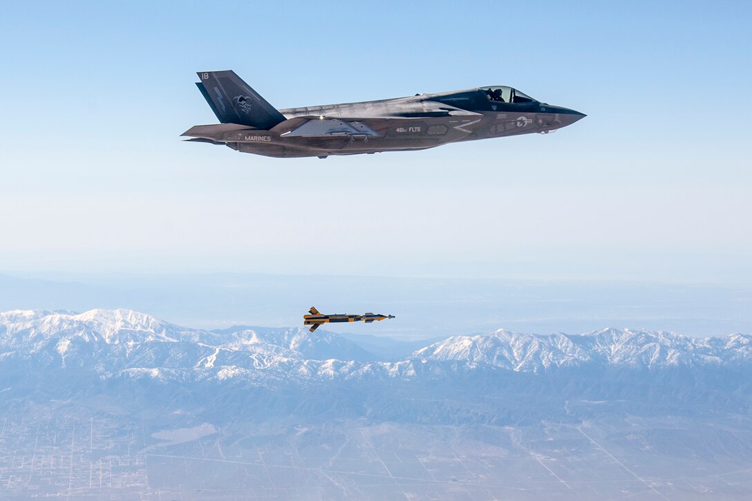 U.S. Marine Corps Maj. Aaron Frey, 461st Flight Test Squadron, pilots an F-35B Lightning II and releases a United Kingdom Paveway IV inert bomb March 1 over Edwards AFB’s Precision Impact Range Area. The Marine Corps’ F-35B is the short takeoff/vertical landing variant of the Joint Strike Fighter, which will also be used by the Royal Air Force. (Photo by Darin Russell/Lockheed Martin)