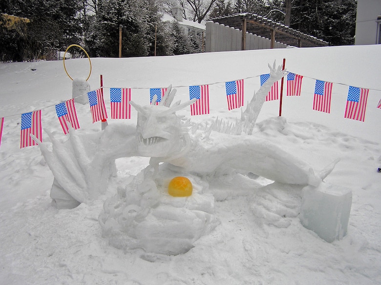 The U.S. Army Engineer Research and Development Center’s Cold Regions Research and Engineering Laboratory once again anchored Hanover’s annual Occom Pond Party snow sculpture contest. Leading the CRREL crew (14+ family members) was Associate Technical Director Randy Hill, who created a Hungarian Horntail Dragon. Besides CRREL’s sculpture, there were two other snow sculptures and all three were declared winners. The Occom Pond Party is a family-oriented event during the Dartmouth College Winter Carnival.