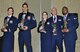 The 302nd Airlift Wing 2016 Annual Awards recipients pose for a photo March 4, 2017 in downtown Colorado Springs, Colorado. From left to right are Maj. Jami Fernandez, 34th Aeromedical Evacuation Squadron, Master Sgt. David
Perez, 302nd Operations Support Squadron, Senior Master Sgt. Belissa Bermudez, 302nd Airlift Wing, Tech. Sgt. Douglas Lemp, 39th Aerial Port Squadron and Senior Airman Elliott Jones, 302nd Civil Engineer Squadron.
(U.S. Air Force photo/Staff Sgt. Amber Sorsek)
