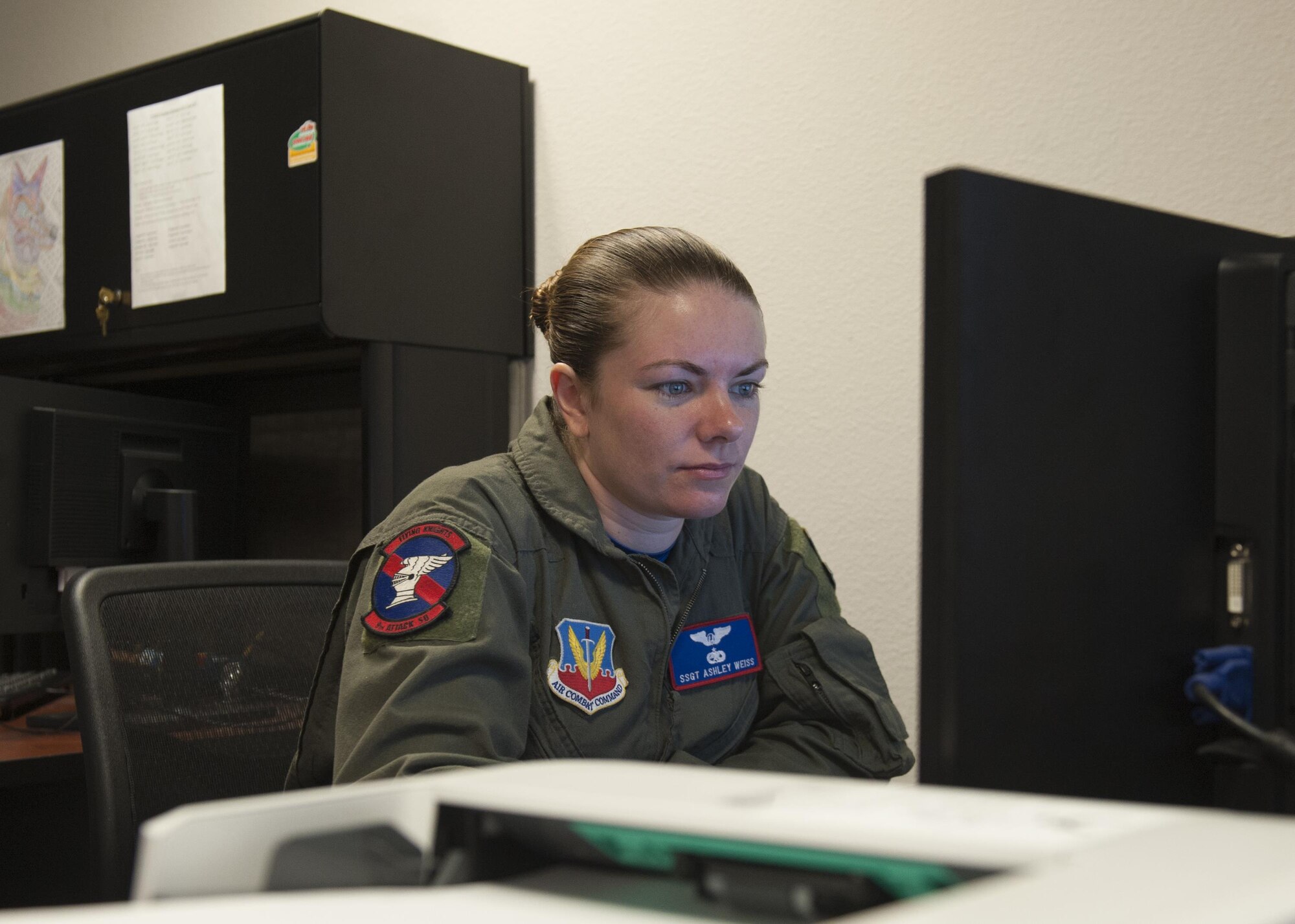 Staff Sgt. Ashley Weiss, a sensor operator instructor assigned to the 9th Attack Squadron, reviews her meeting schedule at Holloman Air Force Base, N.M. March 10, 2017. Weiss was an aircraft maintainer prior to being picked up for the sensor operator instructor position.