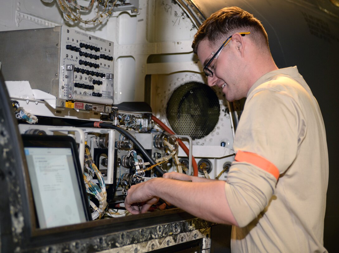 Airman 1st Class David Betchley, an aircraft electrical and environmental systems journeyman assigned to the 28th Maintenance Squadron, changes a volt amp sensor on a B-1 bomber at Ellsworth Air Force Base, S.D., March 8, 2017. After every 800 flight hours, Ellsworth’s bombers are sent to hangar 73 to receive an in-depth inspection process that lasts over the course of 20 days. (U.S. Air Force photo by Airman 1st Class Denise M. Jenson)