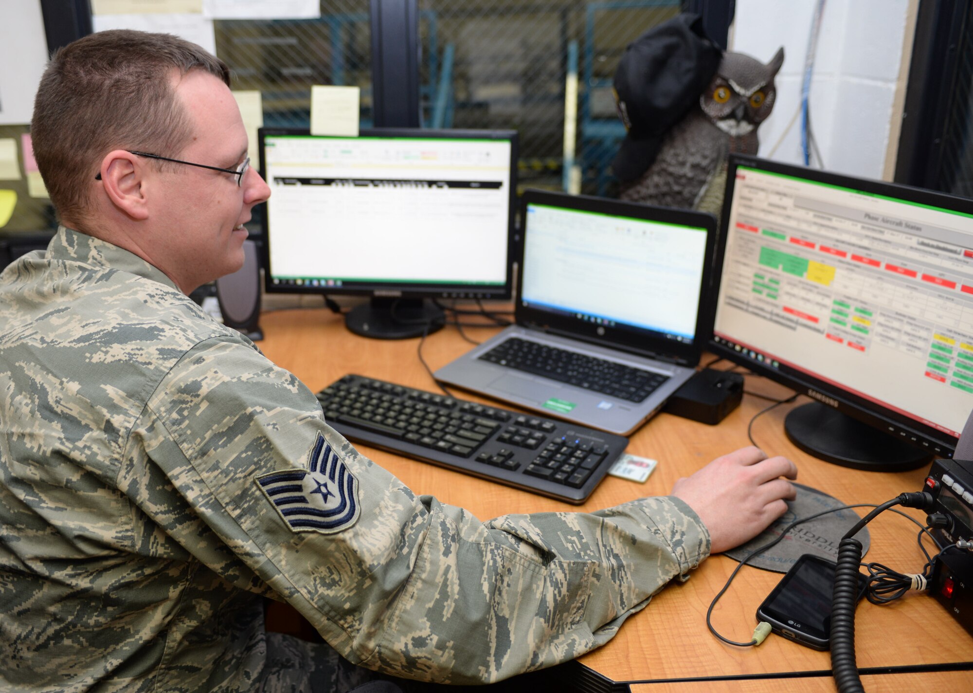 Tech. Sgt. James McCurdy, the phase section monitor assigned to the 28th Maintenance Squadron, looks through his inspection schedule during an 800 flight hour inspection at Ellsworth Air Force Base, S.D., March 8, 2017. During the inspection process, McCurdy is responsible for tracking the scheduled maintenance while establishing Airmen to their respective areas to work on. (U.S. Air Force photo by Airman 1st Class Denise M. Jenson)