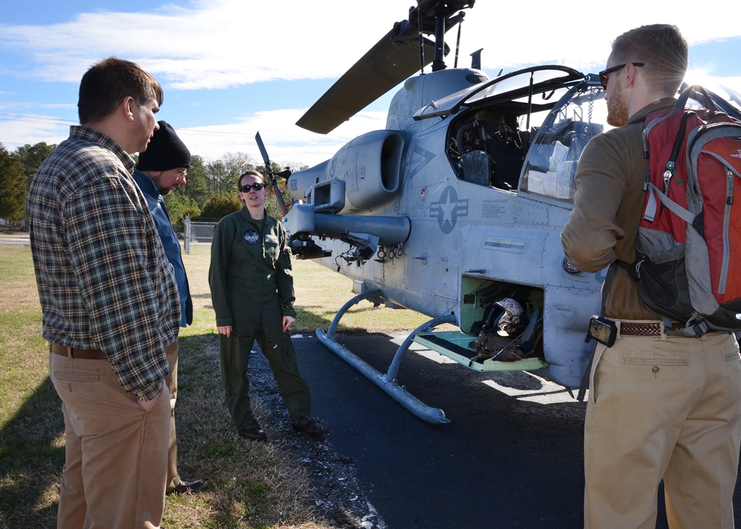 Marine Corps Capt. Pamela Whalen speaks with members of the Defense Logistics Agency Aviation team during a meet and greet March 8, 2017 at Defense Supply Center Richmond, Virginia. Whalen was a member of the flight crew for the AH-1W Cobra helicopter. (Photo by Jackie Roberts)