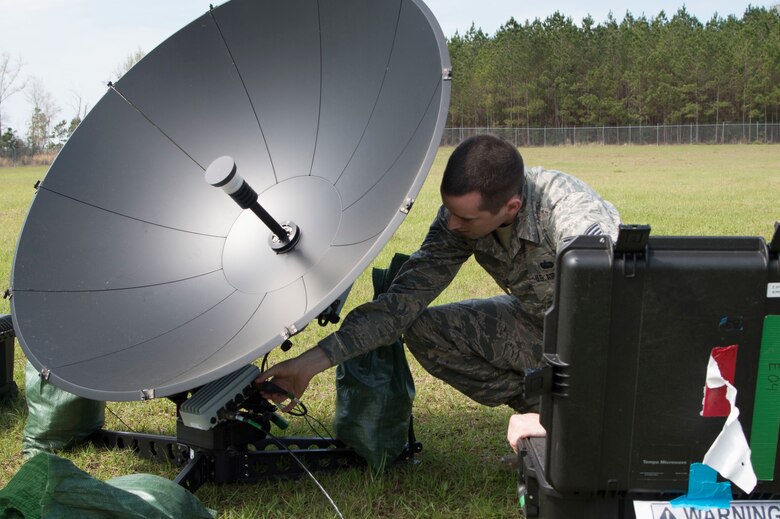 U.S. Air Force Staff Sgt. Alan Lemay a cyber transport journeyman with the 621st Contingency Response Wing stationed at Joint Base McGuire-Dix-Lakehurst, N.J., dismantles the Small Communications Package during exercise Crisis Response 2017, March 9, 2017, Camp Shelby, Miss. The 621st Contingency Response Wing (821st CRG and 621st CRG) provides the core cadre of expeditionary command and control, airlift and air refueling operations, aerial port, and aircraft maintenance personnel for deployment worldwide as mobility control teams and airfield assessment teams. (U.S. Air Force photo by Staff Sgt. Robert Waggoner/RELEASED)