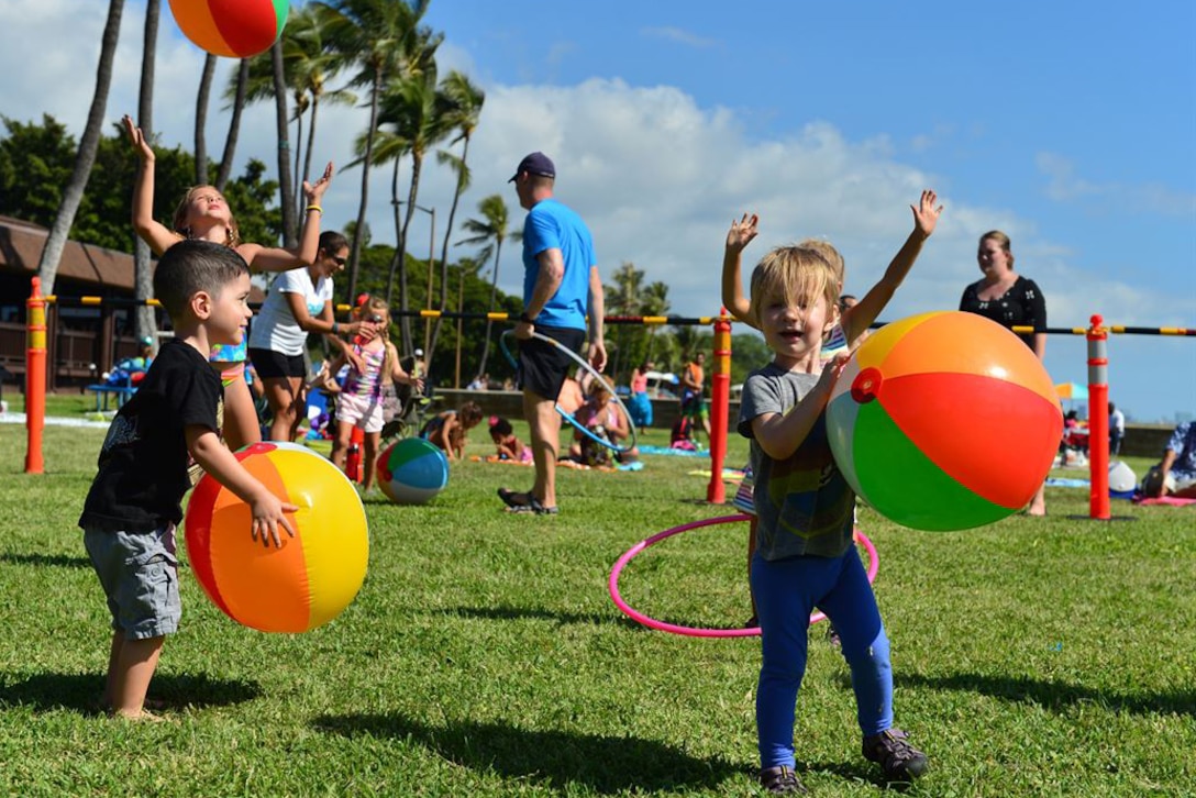 Children play in the kid-zone during Beach Fest.