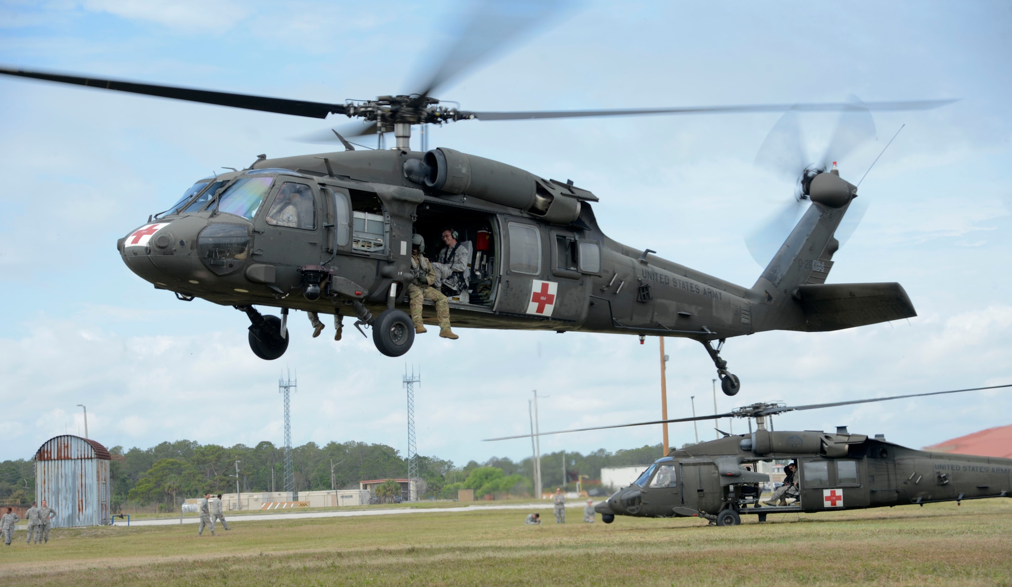 A UH-60 Pave Hawk helicopter begins to take off during an aeromedical evacuation exercise at MacDill Air Force Base, Fla., March 12, 2017. Airmen from the 6th Medical Group had the opportunity to fly in the HH-60 Black Hawk to experience the space and requirements needed for a safe and effective aeromedical evacuation. (U.S. Air Force photo by Senior Airman Tori Schultz)
