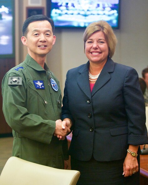 Republic of Korea Air Force Brig. Gen. Yoon Byung Ho (left), ROKAF Headquarters Office of Policy chief, greets Ms. Hiedi H. Grant (right), Deputy Under Secretary of the Air Force, International Affairs, during the Pacific F-35 Symposium at Joint Base Pearl Harbor-Hickam, Hawaii, March 15, 2017. The symposium is a Pacific Air Forces-hosted event that brings together the four Pacific members of the F-35 program: Japan, Australia, the Republic of Korea and the U.S. While attending the event, senior officers, warfighters and F-35 experts discussed a range of topics related to integrating the F-35 into multilateral air operations in the Indo-Asia-Pacific. The U.S. currently flies the F-35B out of Marine Corps Air Station Iwakuni, Japan, and is scheduled to field two additional squadrons at Eielson AFB, Alaska, starting in 2020. Australia and Japan are already flying their own F-35s and the ROK is projected to receive its first in 2018. (U.S. Air Force photo by Tech. Sgt. James Stewart)