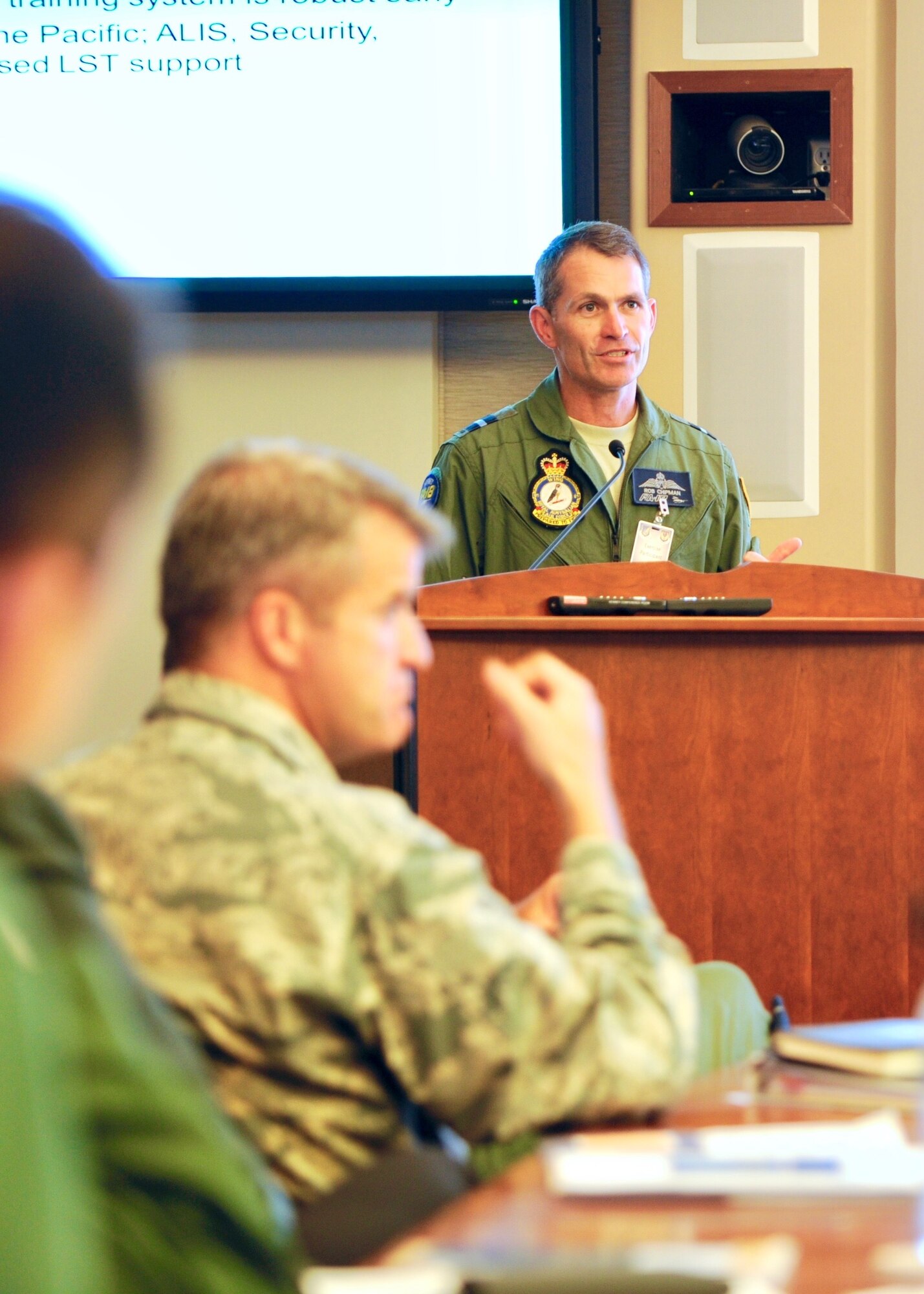 Royal Australian Air Force Air Cdre Robert Chipman, General Planning Capability director, gives a country briefing during the Pacific F-35 Symposium at Joint Base Pearl Harbor-Hickam, Hawaii, March 15, 2017. The symposium is a Pacific Air Forces-hosted event that brings together the four Pacific members of the F-35 program: Japan, Australia, the Republic of Korea and the U.S. While attending the event, senior officers, warfighters and F-35 experts discussed a range of topics related to integrating the F-35 into multilateral air operations in the Indo-Asia-Pacific. The U.S. currently flies the F-35B out of Marine Corps Air Station Iwakuni, Japan, and is scheduled to field two additional squadrons at Eielson AFB, Alaska, starting in 2020. Australia and Japan are already flying their own F-35s and the ROK is projected to receive its first in 2018. (U.S. Air Force photo by Master Sgt. George Maddon)