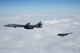 A B-1B Lancer and B-2 Spirit fly near Barksdale Air Force Base, La., Feb. 2, 2017. The two bombers, along with a B-52 Stratofortress, flew an in-trail formation over Barksdale AFB during a retreat ceremony held by the Eighth Air Force. Distinguished guests, leadership and ‘Mighty Eighth’ Airmen gathered to celebrate the Eighth Air Force’s 75th anniversary by partaking in various events throughout the week. Eighth Air Force dates back to VIII Bomber Command and World War II, which came into being Feb. 1, 1942.  (U.S. Air Force courtesy photo by Sagar Pathak)