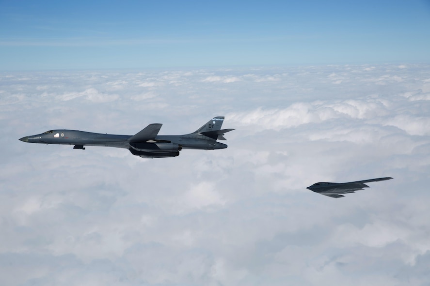 A B-1B Lancer and B-2 Spirit fly near Barksdale Air Force Base, La., Feb. 2, 2017. The two bombers, along with a B-52 Stratofortress, flew an in-trail formation over Barksdale AFB during a retreat ceremony held by the Eighth Air Force. Distinguished guests, leadership and ‘Mighty Eighth’ Airmen gathered to celebrate the Eighth Air Force’s 75th anniversary by partaking in various events throughout the week. Eighth Air Force dates back to VIII Bomber Command and World War II, which came into being Feb. 1, 1942.  (U.S. Air Force courtesy photo by Sagar Pathak)