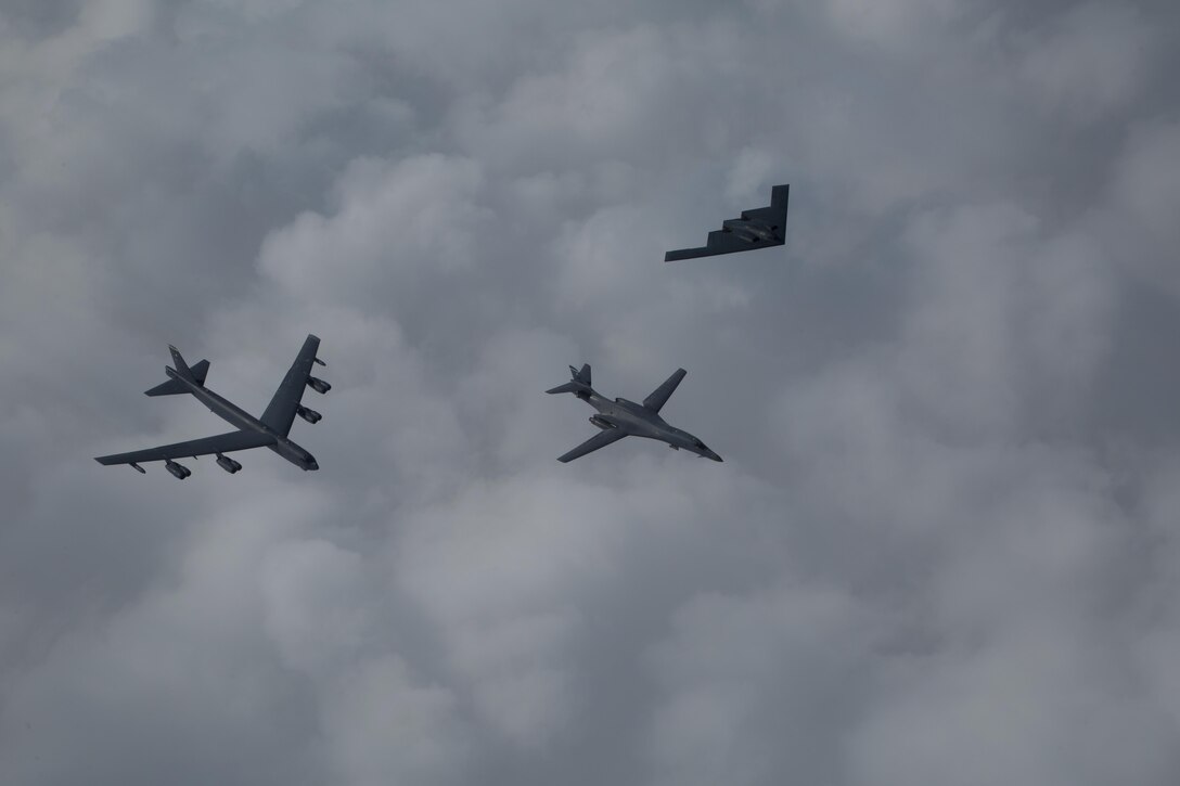 A B-52 Stratofortress, B-1B Lancer and B-2 Spirit fly near Barksdale Air Force Base, La., Feb. 2, 2017. The bombers participated in the flyover as part of the Eighth Air Force’s 75th anniversary events. Former and present bomber Airmen from across the country celebrated the anniversary by partaking in various event to honor the past, present and future Airmen of the “Mighty Eighth.” (U.S. Air Force courtesy photo by Sagar Pathak)		