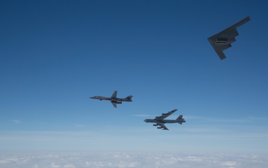 A B-2 Spirit, B-1B Lancer and B-52 Stratofortress practice flyover formations near Barksdale Air Force Base, La., Feb. 2, 2017. The bombers participated in a flyover as part of a celebration of the Eighth Air Force’s 75th anniversary. The Eighth Air Force, also known as “The Mighty Eighth,” dates back to World War II. At its peak, the unit was comprised of approximately 200,000 members and had the capability to dispatch more than 1,000 four-engine bombers and varieties of fighter aircraft on a single mission. (U.S. Air Force courtesy photo by Sagar Pathak)	