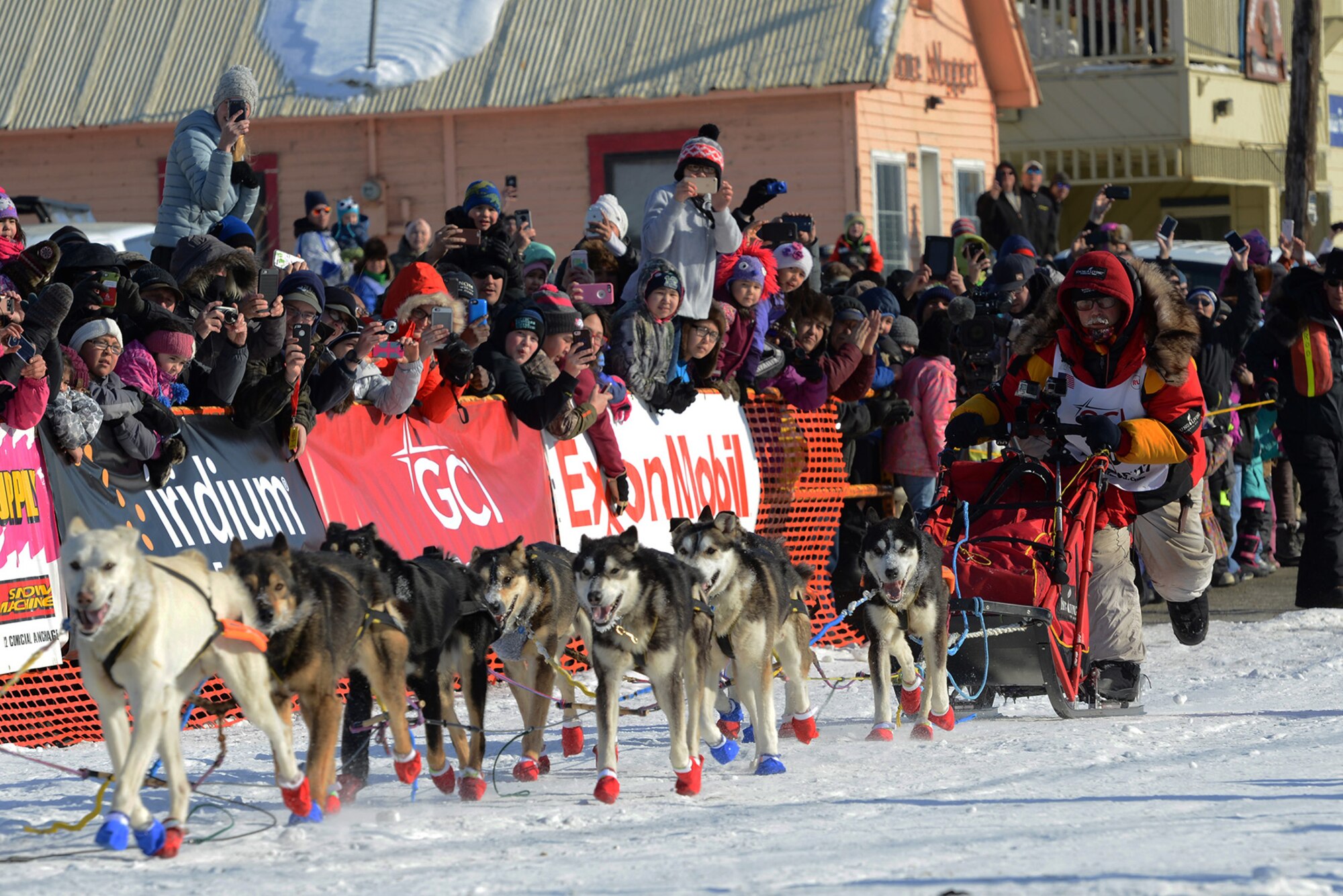 Mitch Seavey rides to the finish line of the 45th Iditarod Trail Sled Dog Race in Nome, Alaska, March 14, 2017. The Iditarod is an annual 1,000-mile race challenging mushers and dog teams alike under cold weather conditions to the finish line in Nome.
