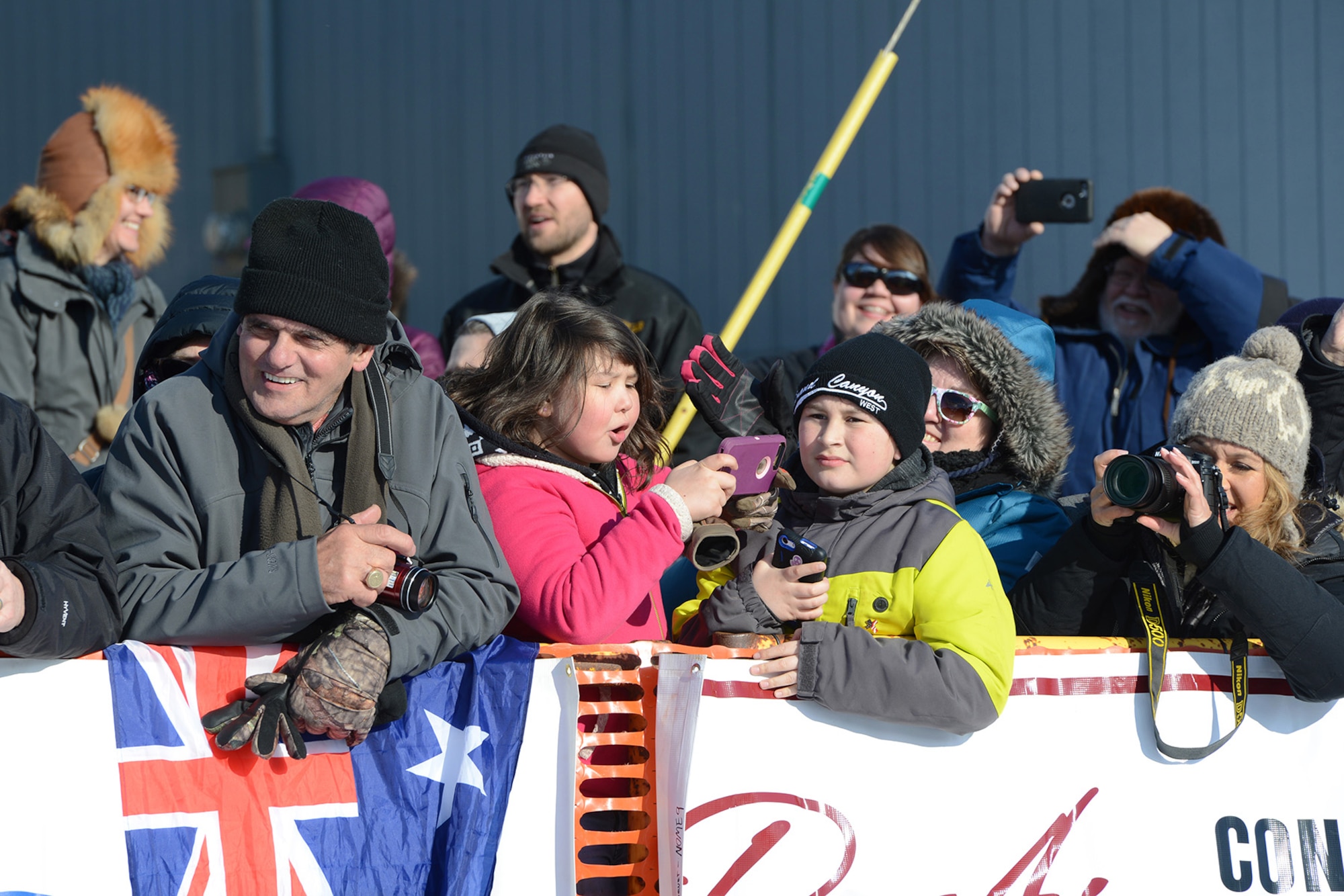 Pedestrians enjoy the 45th Iditarod Trail Sled Dog Race celebration in Nome, Alaska, March 14, 2017. Nome hosts the finish line of Alaska’s Last Great Race, sometimes referred to as the ‘Mardi Gras of the North,’ and approximately 1,000 people arrive in Nome to participate in the event. 