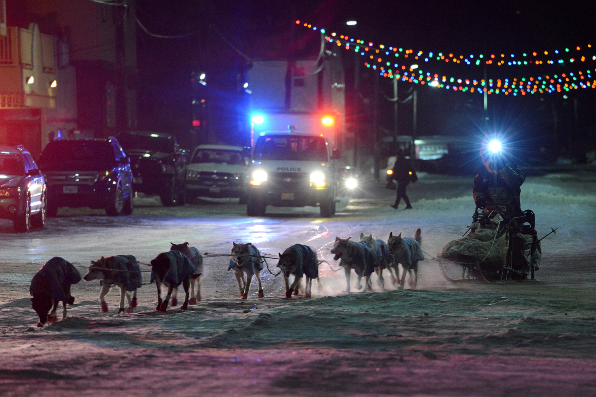 Rick Casillo, Battle Dogs founder and Iditarod Trail Sled Dog Race veteran, mushes to the finish line in Nome, Alaska, March 15, 2017.  The Iditarod is an annual 1,000-mile race challenging mushers and dog teams alike under cold weather conditions and long distance travel to the finish line in Nome. 