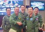 Republic of Korea Air Force Brig. Gen. Yoon Byung Ho (left), ROKAF Headquarters Office of Policy chief, greets U.S. Navy Rear Adm. Mathias Winter, F-35 Lightning II Joint Progam Office deputy program executive officer, during the Pacific F-35 Symposium at Joint Base Pearl Harbor-Hickam, Hawaii, March 15, 2017. The symposium is a Pacific Air Forces-hosted event that brings together the four Pacific members of the F-35 program: Japan, Australia, the Republic of Korea and the U.S. While attending the event, senior officers, warfighters and F-35 experts discussed a range of topics related to integrating the F-35 into multilateral air operations in the Indo-Asia-Pacific. The U.S. currently flies the F-35B out of Marine Corps Air Station Iwakuni, Japan, and is scheduled to field two additional squadrons at Eielson AFB, Alaska, starting in 2020. Australia and Japan are already flying their own F-35s and the ROK is projected to receive its first in 2018.