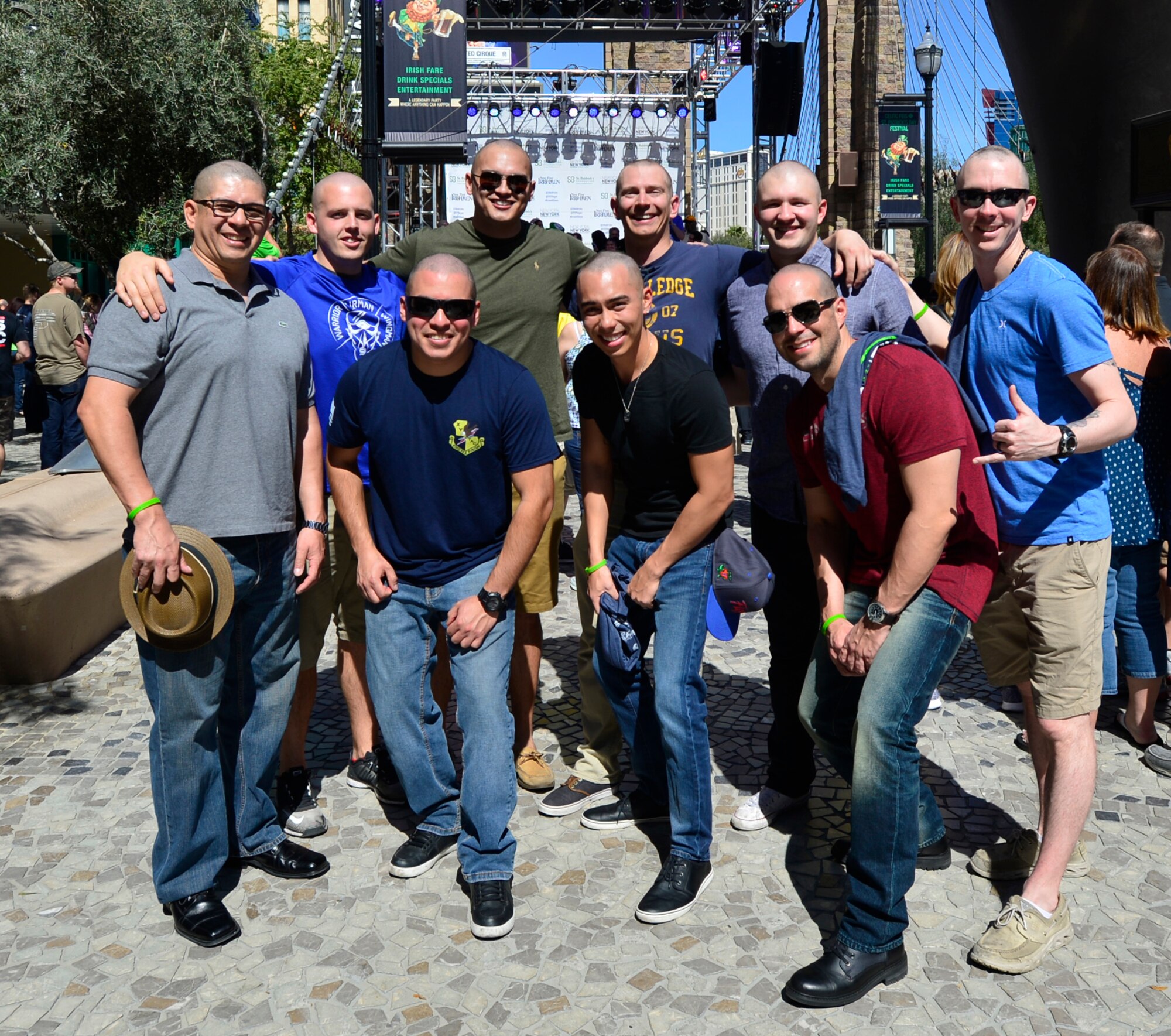 Members of the 15th Attack Squadron gather after shaving their heads for a fundraiser to support childhood cancer organizations March 11, 2017, in Las Vegas. The members raised approximately $2,000 to go towards childhood cancer cures. (U.S. Air Force photo/Senior Airman Christian Clausen)