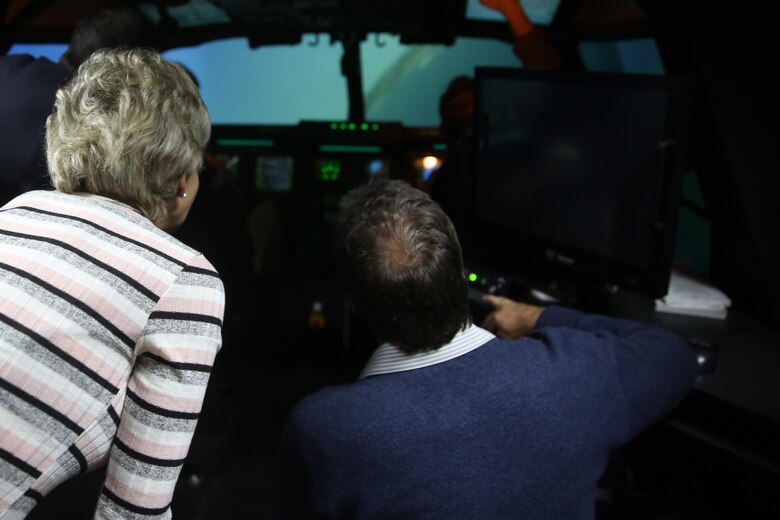 Orthopaedic surgeons and their spouses visited Marine Corps Air Station Miramar, Calif., for a day to participate in a subject matter exchange, March 15. Additionally, the members of the American Academy of Orthopaedic Surgeons and their spouses had the opportunity to fly four flight simulators while learning about the different aircraft with 3rd MAW. (U.S. Marine Corps photo by Sgt. David Bickel/Released)