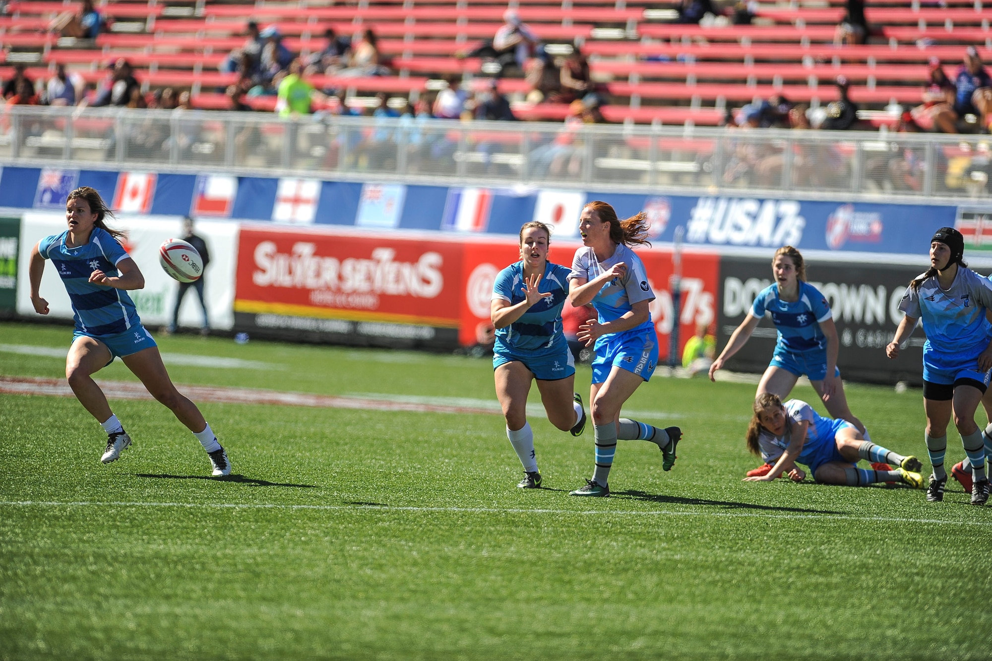 Emily Raney, a fly half on the Air Force women’s rugby sevens team, pitches the ball during a Las Vegas Invitational match in Sam Boyd Stadium, Las Vegas, March 3, 2017. USA Rugby, the national governing body for the sport of rugby union, was so supportive of the Air Force women’s rugby sevens initiative that the team’s final game of pool play was moved to the 35,000-seat Sam Boyd Stadium and played in conjunction with the HSBC World Series’ Las Vegas stop. (U.S. Air Force photo by Staff Sgt. Siuta B. Ika)