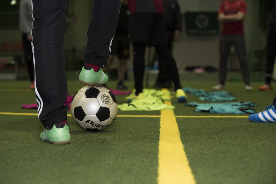 A Misawa United member rests his foot on a soccer ball prior to the start of soccer practice at Misawa, Japan, March 14, 2017. The group is the first soccer team in the Misawa Football Association to include Japan nationals and American nationals on their team. The men and women of Misawa Air Base’s engagement with the community is vital to maintaining the 50 years of good relations between two nations. (U.S. Air Force photo by Staff Sgt. Melanie Hutto)