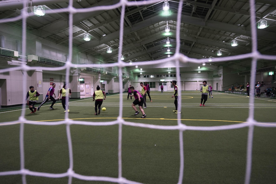 Misawa United team members play a practice soccer game at a local indoor arena in Misawa, Japan, March 14, 2017. The Misawa United team started practice in October 2016. The team trains once a week and invites anyone to come play, even if just for a pick-up game. The strong partnership between the two nations remain strong after 50 years because the men and woman of Misawa Air Base step out of their comfort zone and built personal relationship with the Japanese. (U.S. Air Force photo by Staff Sgt. Melanie Hutto)
