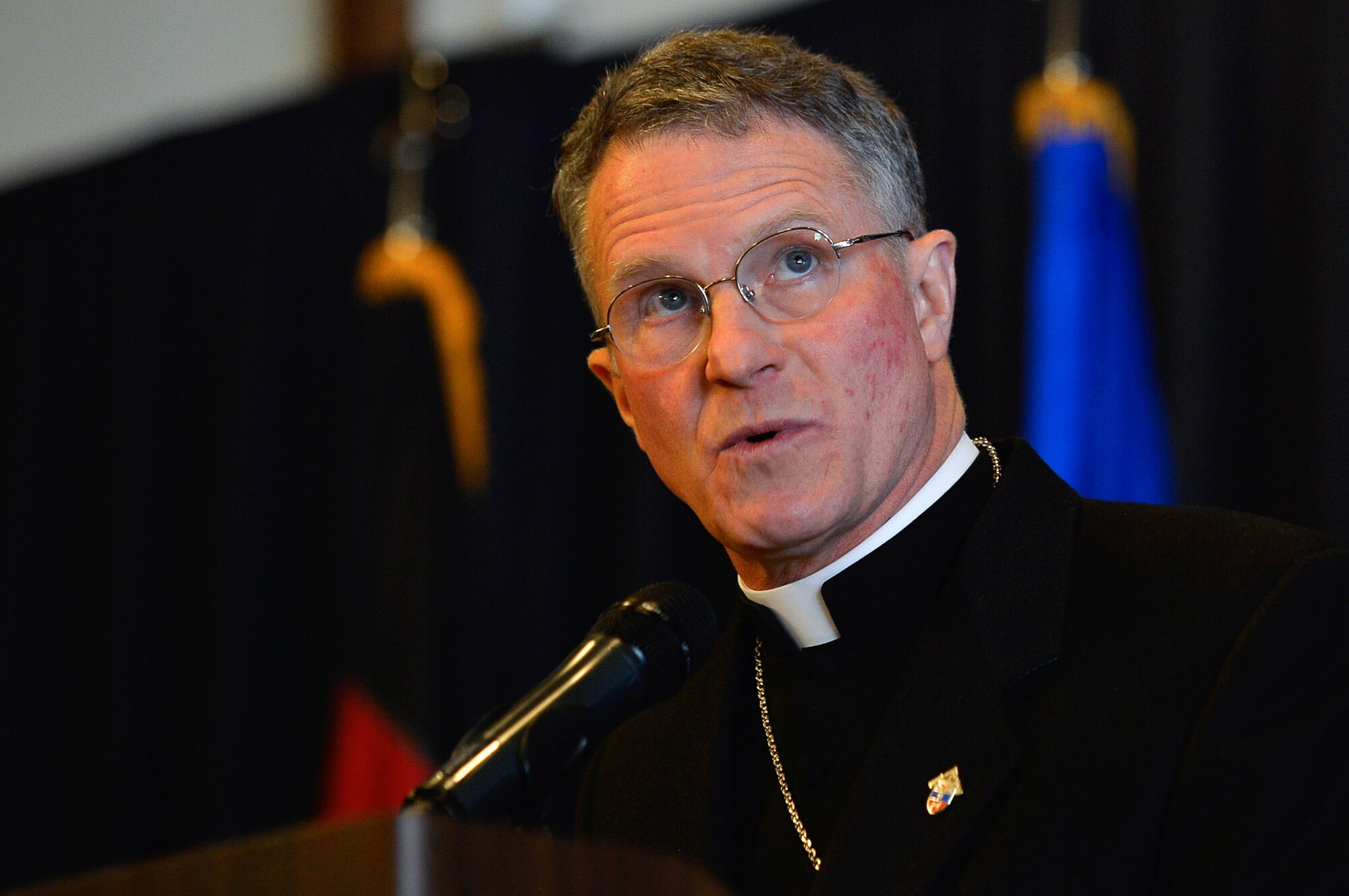Archbishop P. Broglio, head of the Archdiocese for the Military Services, speaks to the congregants of the 86th Airlift Wing's National Prayer Breakfast on Ramstein Air Base, Germany, March 13, 2017. The event is a celebration of the freedom of religion, which was provided by the U.S. Bill of Rights upon its ratification on December 15, 1791. The First Amendment protects each individual's freedom to practice a religion of their choice and prevents the government from favoring any particular religion. (U.S. Air Force photo by Airman 1st Class Joshua Magbanua)