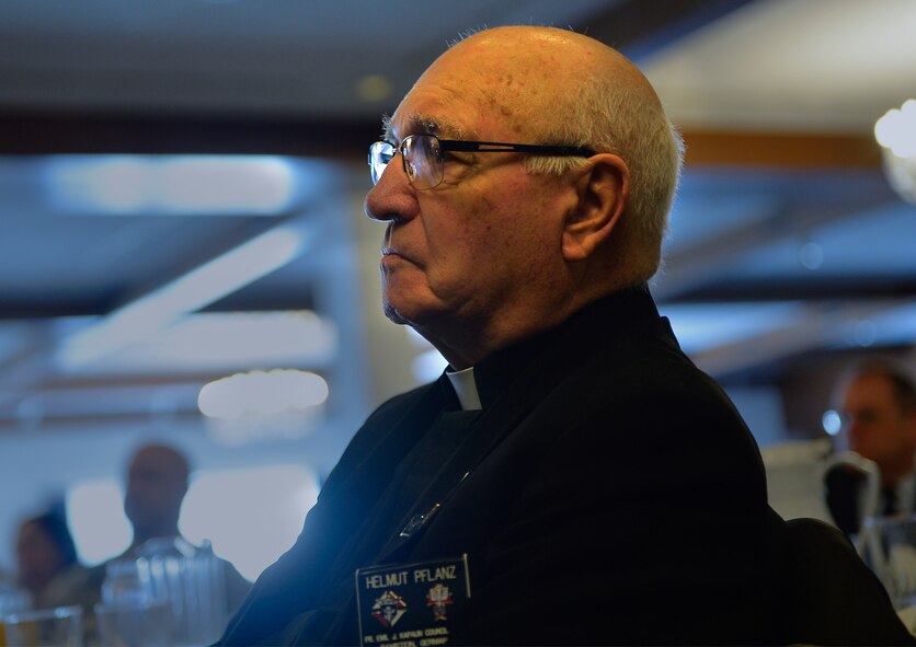 A priest attends an annual prayer breakfast on Ramstein Air Base, Germany, March 13, 2017. The 86th Airlift Wing Chaplain Corps hosted the interdenominational event, which celebrates the freedom of religion. The prayer breakfast saw participation from all branches of the military as well as civilians. (U.S. Air Force photo by Airman 1st Class Joshua Magbanua)