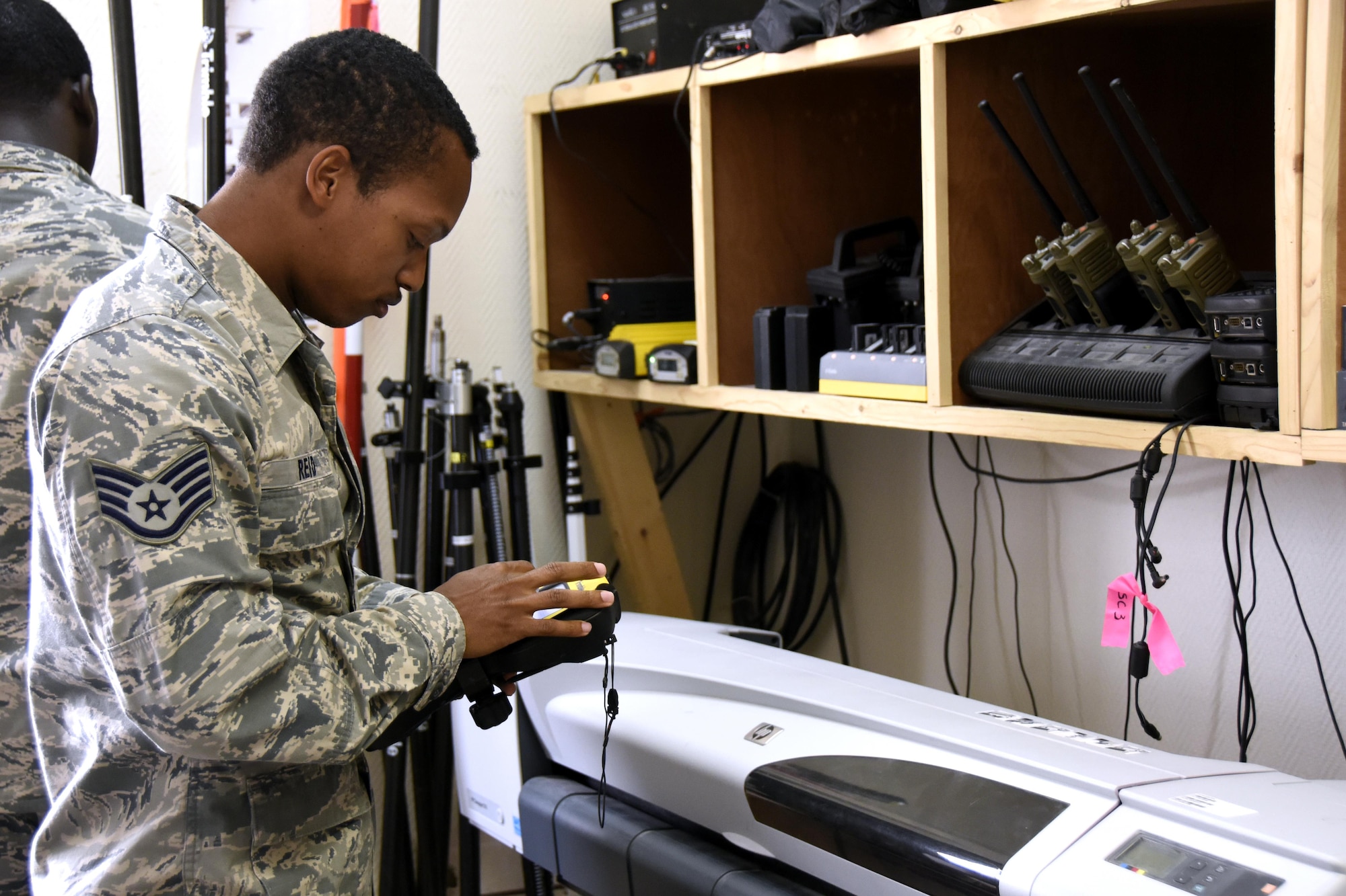 U.S. Air Force Staff Sgt. Edward Reid, NCO in charge of the GEOBASE section with the 379th Expeditionary Civil Engineer Squadron, prepares survey equipment at Al Udeid Air Base, Qatar, March 15, 2017. Airmen with the GEOBASE section survey, map, draft and maintain common installation picture maps and have the ability to produce unit specific maps of Al Udeid AB. GEOBASE Airmen also use those maps and equipment to plot out points on construction sites around the base. (U.S. Air Force photo by Senior Airman Cynthia A. Innocenti)