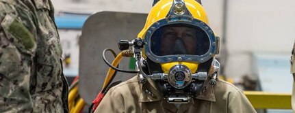 VADM Moore completing a communications check.