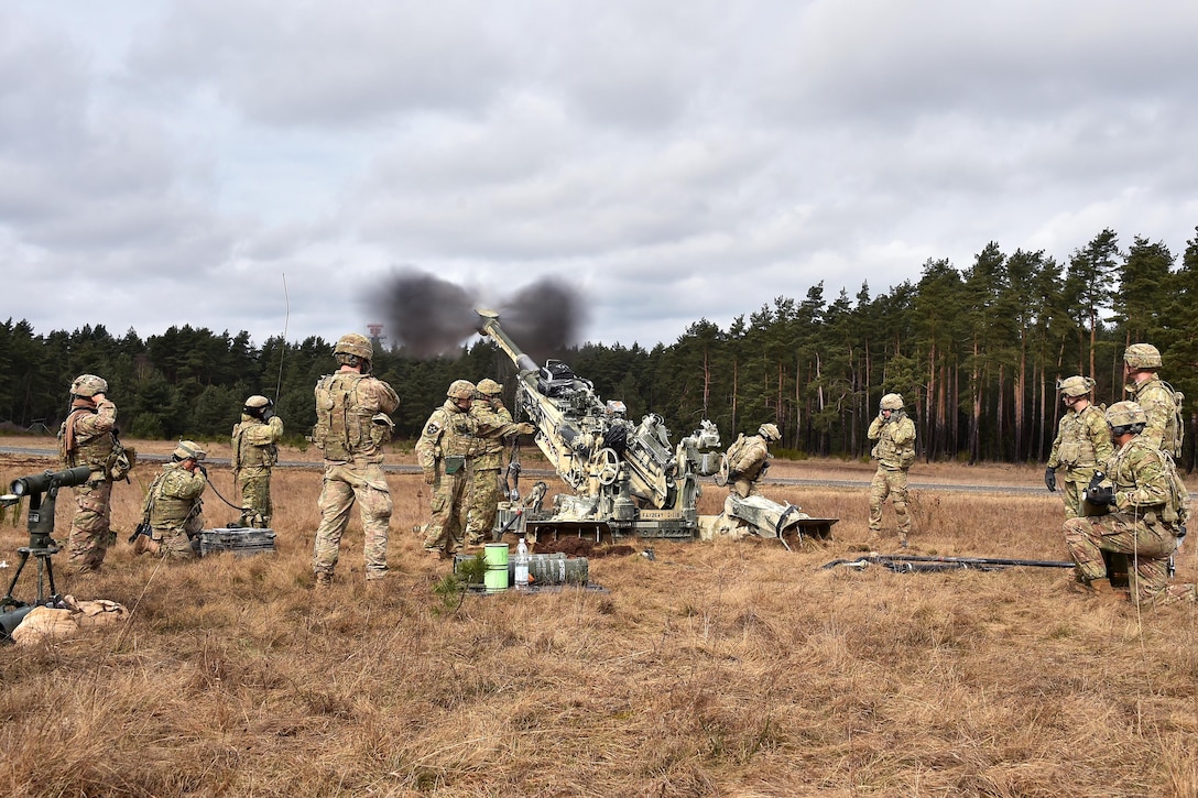 Soldiers fire an M777 howitzer during exercise Dynamic Front II at the 7th Army Training Command's Grafenwoehr Training Area, Germany, March 9, 2017. Army photo by Gertrud Zach