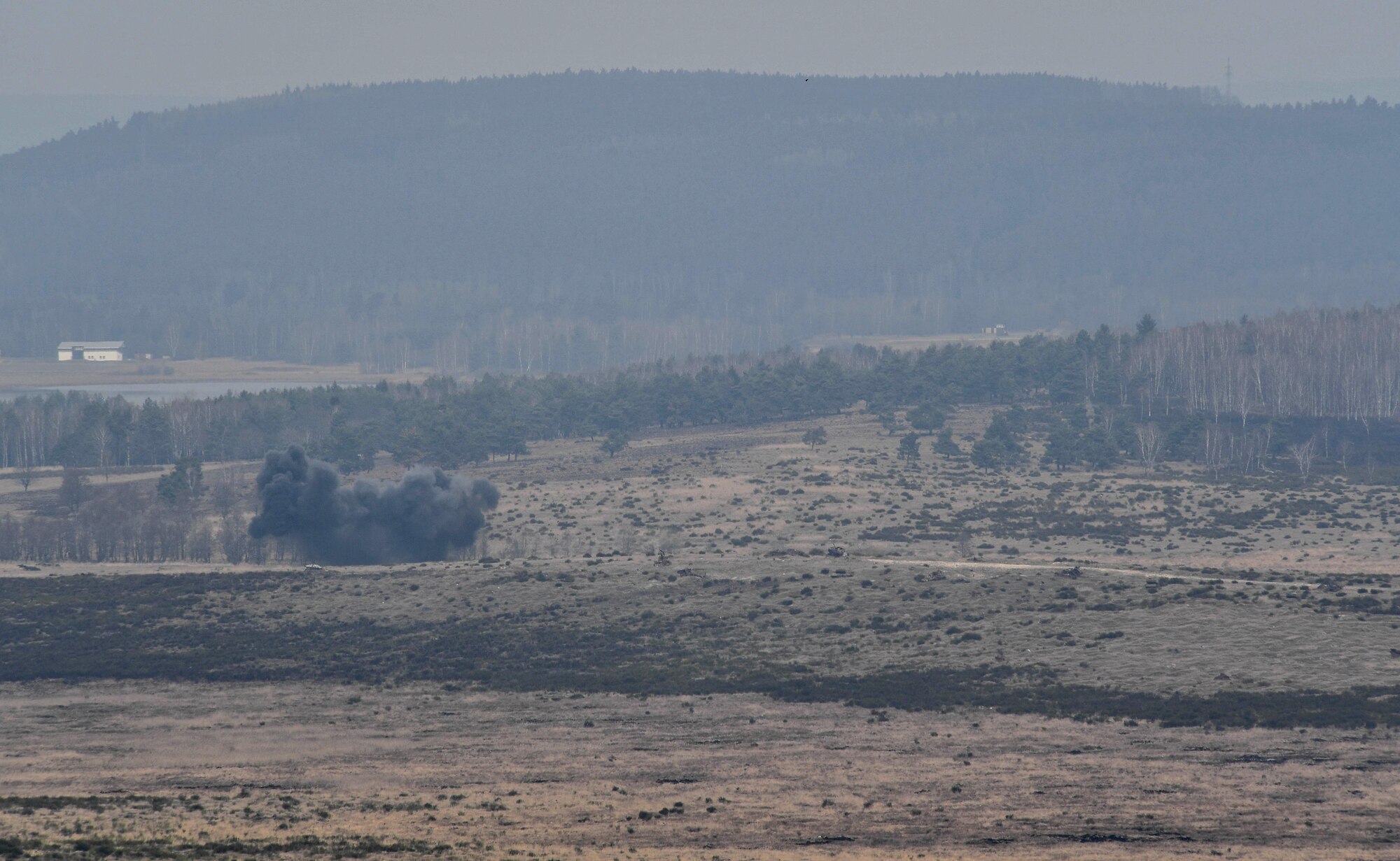 A smoke cloud rises into the air during the U.S. Air Forces in Europe Air-Ground Operations School’s Joint Terminal Attack Controller Qualification Course at Grafenwoehr Training Area, Germany, March 14, 2017. The course is the first step for tactical air control party Airmen to qualify as a JTAC. (U.S Air Force photo by Senior Airman Tryphena Mayhugh)