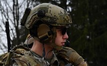 U.S. Air Force Senior Airman Jacob Hughes, 146th Air Support Operations Squadron tactical air control party, describes the location of a target to an A-4 Skyhawk pilot during the U.S. Air Forces in Europe Air-Ground Operations School’s Joint Terminal Attack Controller Qualification Course at Grafenwoehr Training Area, Germany, March 14, 2017. Once the pilot confirmed the location of the target, the students cleared the aircraft to proceed, upon which it either dropped live ammunition or did a dry run. (U.S Air Force photo by Senior Airman Tryphena Mayhugh)