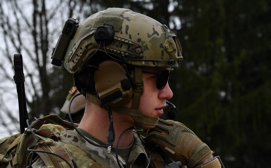 U.S. Air Force Senior Airman Jacob Hughes, 146th Air Support Operations Squadron tactical air control party, describes the location of a target to an A-4 Skyhawk pilot during the U.S. Air Forces in Europe Air-Ground Operations School’s Joint Terminal Attack Controller Qualification Course at Grafenwoehr Training Area, Germany, March 14, 2017. Once the pilot confirmed the location of the target, the students cleared the aircraft to proceed, upon which it either dropped live ammunition or did a dry run. (U.S Air Force photo by Senior Airman Tryphena Mayhugh)