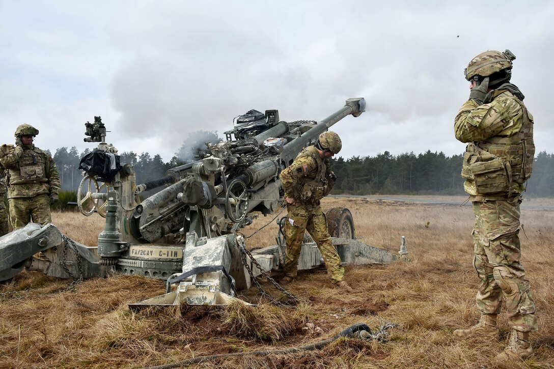 Soldiers fire an M777 Howitzer during exercise Dynamic Front II at the 7th Army Training Command's Grafenwoehr Training Area, Germany, March 9, 2017. Army photo by Gertrud Zach