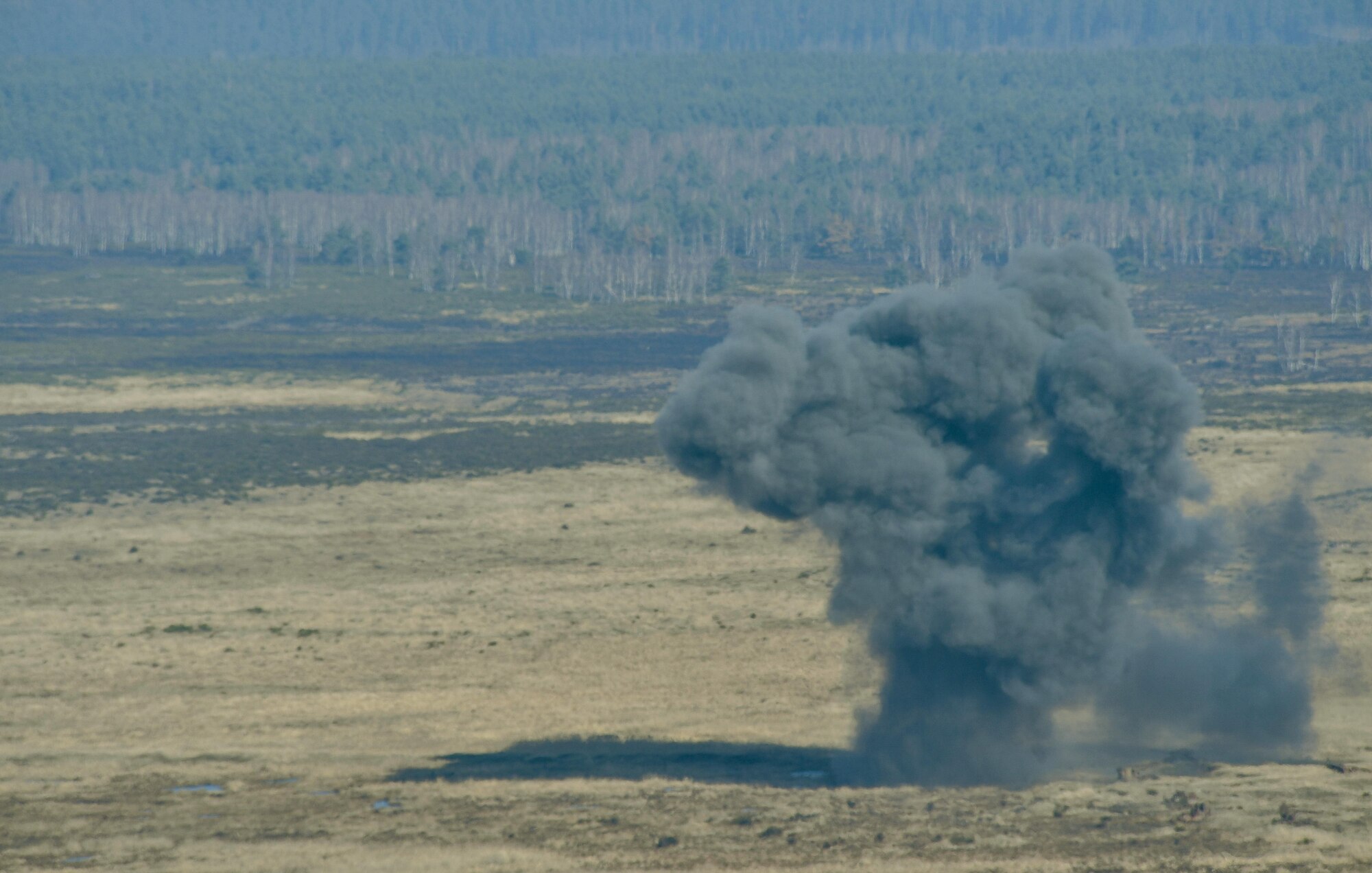 A smoke cloud rises into the air during the U.S. Air Forces in Europe Air-Ground Operations School’s Joint Terminal Attack Controller Qualification Course at Grafenwoehr Training Area, Germany, March 14, 2017. The JTACQC is the first step for tactical air control party Airmen to qualify as a JTAC. (U.S Air Force photo by Senior Airman Tryphena Mayhugh)