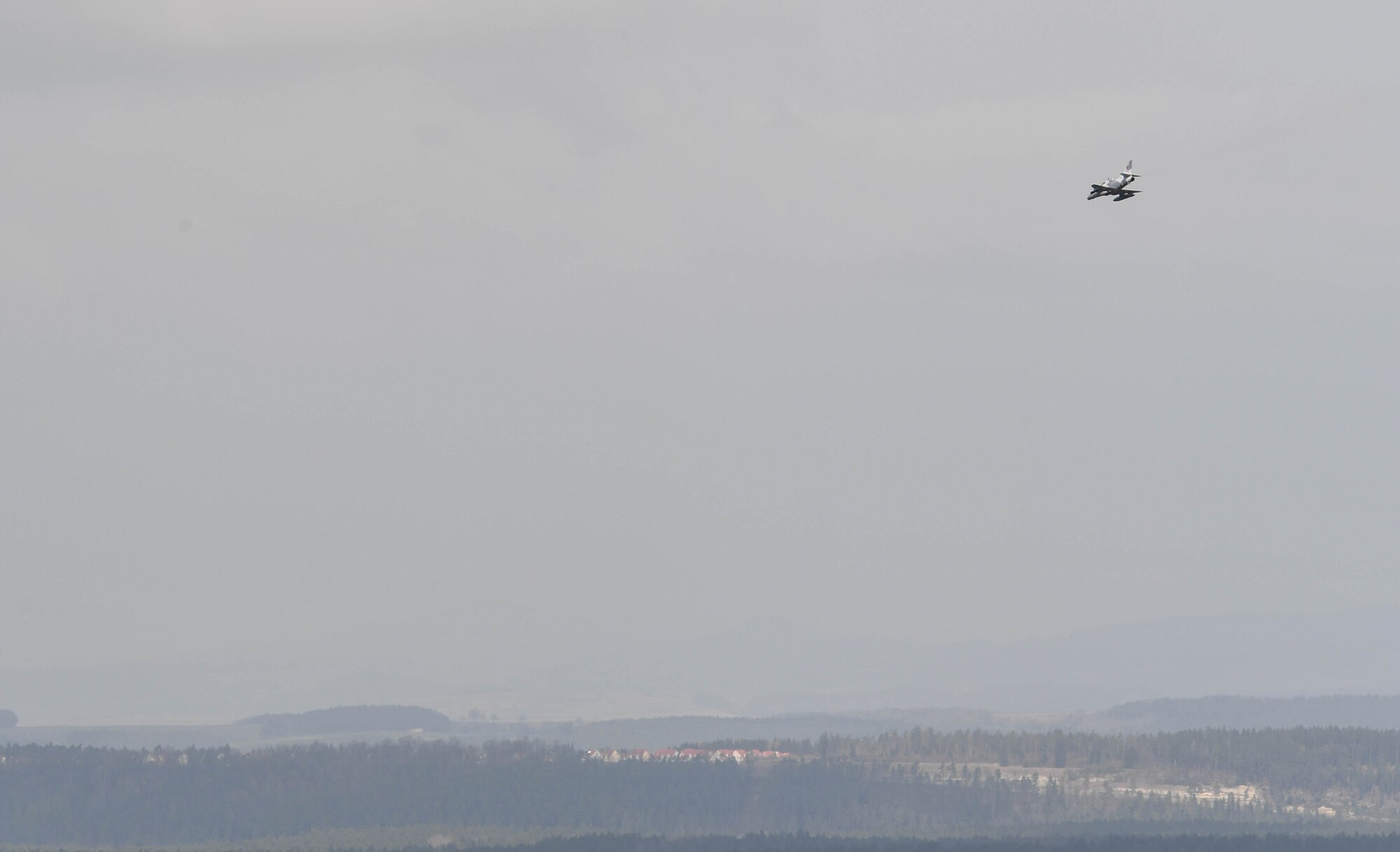 An A-4 Skyhawk flies in to attack a target during the U.S. Air Forces in Europe Air-Ground Operations School’s Joint Terminal Attack Controller Qualification Course at Grafenwoehr Training Area, Germany, March 15, 2017. The JTACQC students participated in a variety of scenarios where they talked with F-16 Flying Falcon and A-4 pilots to lead them to a target during the training. (U.S Air Force photo by Senior Airman Tryphena Mayhugh)