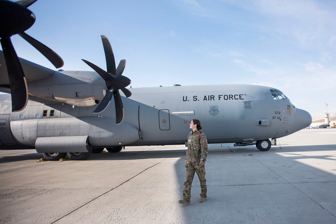Capt. Amanda Montague performs a preflight check at Bagram Airfield, Afghanistan, March 8, 2017. Montague is a 774th Expeditionary Airlift Squadron C-130J Hercules pilot and serves as aircraft commander for her assigned crew. Air Force photo by Staff Sgt. Katherine Spessa