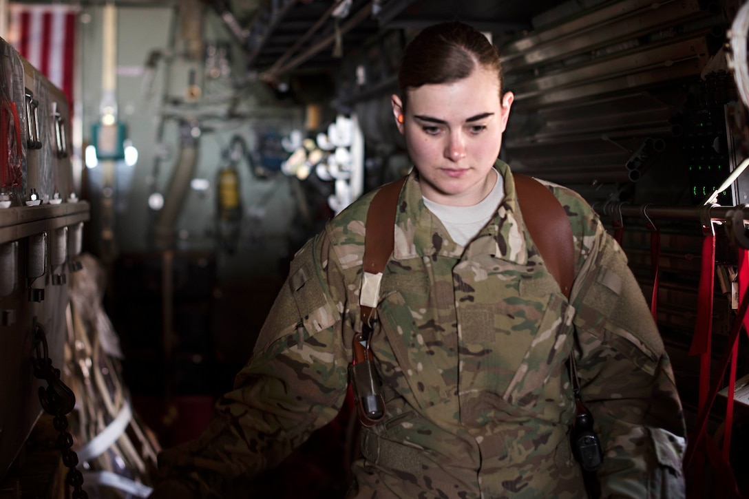 Air Force Senior Airman Samantha Masten performs a preflight inspection inside the cargo bay of a C-130J Hercules aircraft before a mission at Bagram Airfield, Afghanistan, March 8, 2017. Masten is a loadmaster assigned to the 774th Expeditionary Airlift Squadron, and provides tactical airlift support. Air Force photo by Staff Sgt. Katherine Spessa
